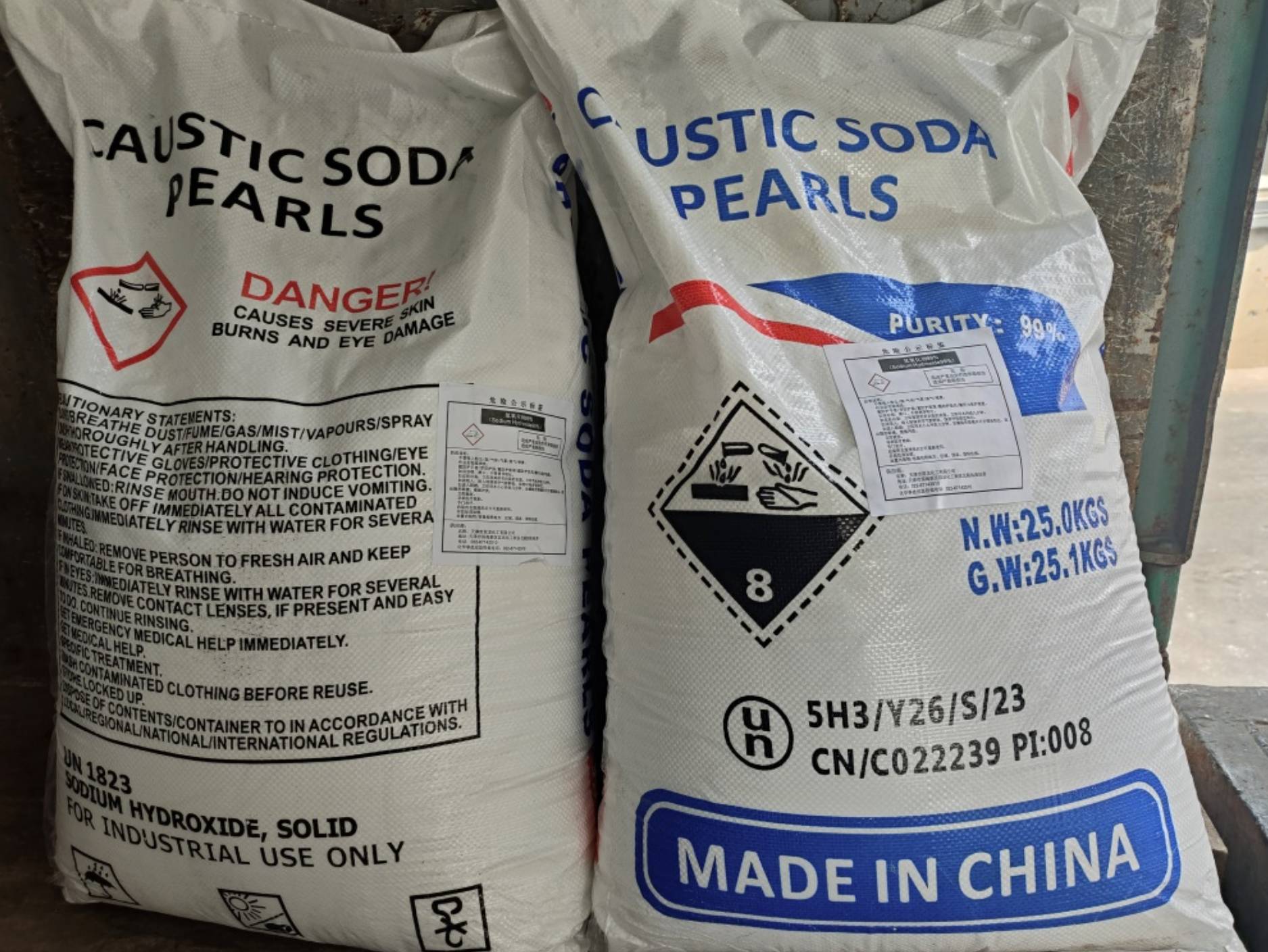 Palletized bags of caustic soda pearls prepared for bulk export and industrial use.