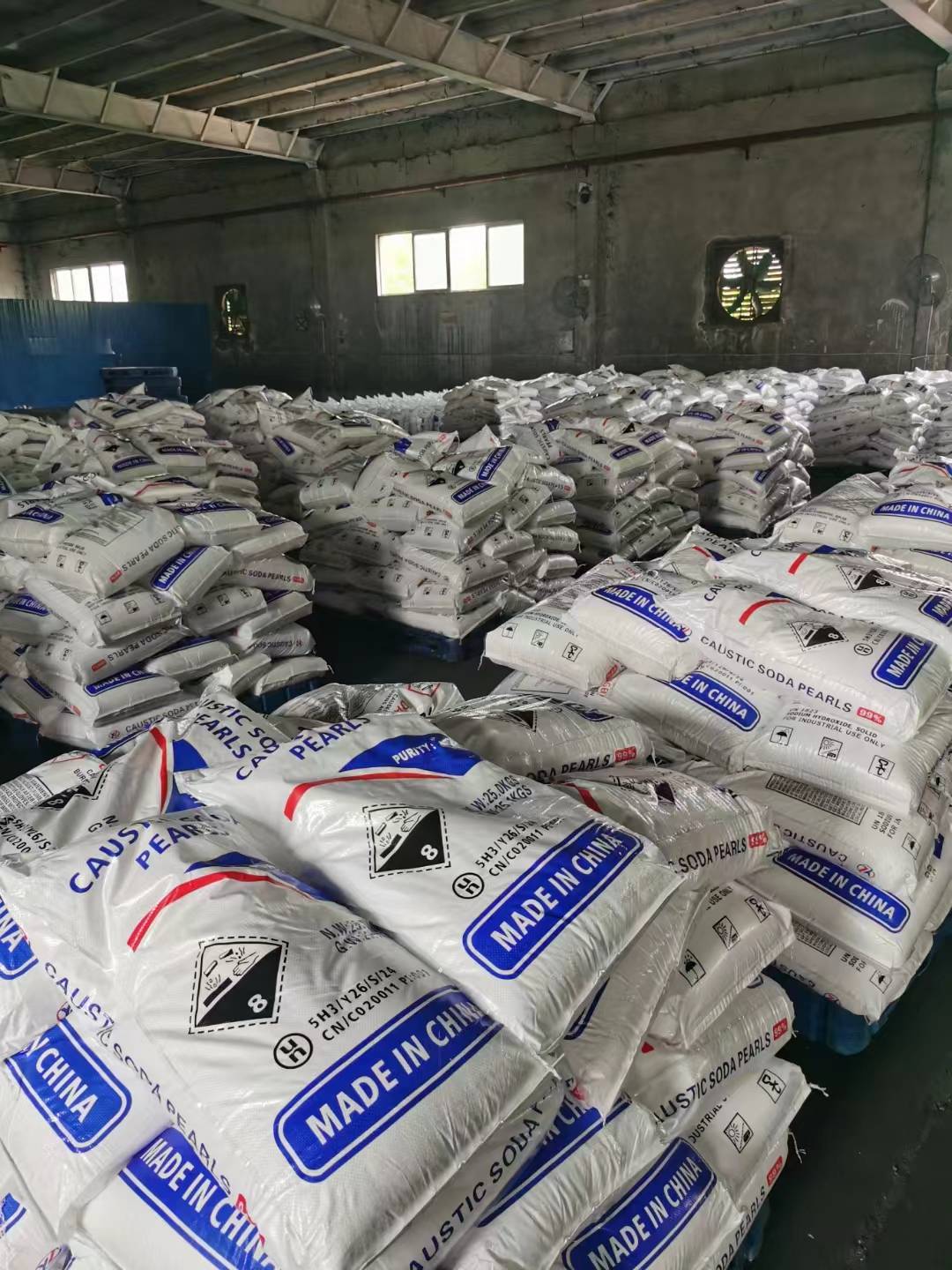 Caustic soda pearls stored in warehouse prior to export from China