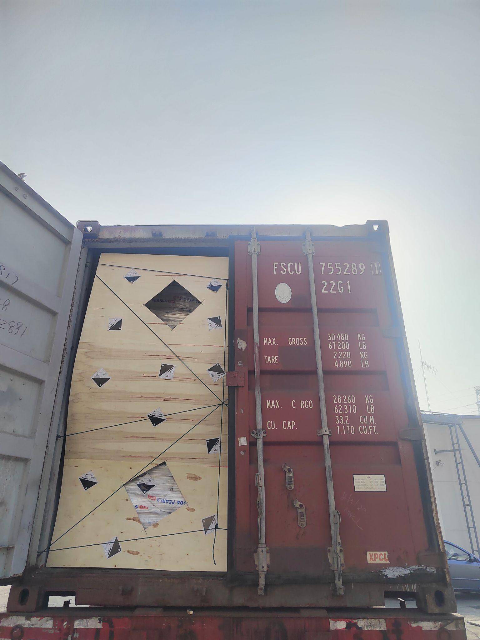 Hazardous material container loading with clear caustic soda markings to be used for the usa industry