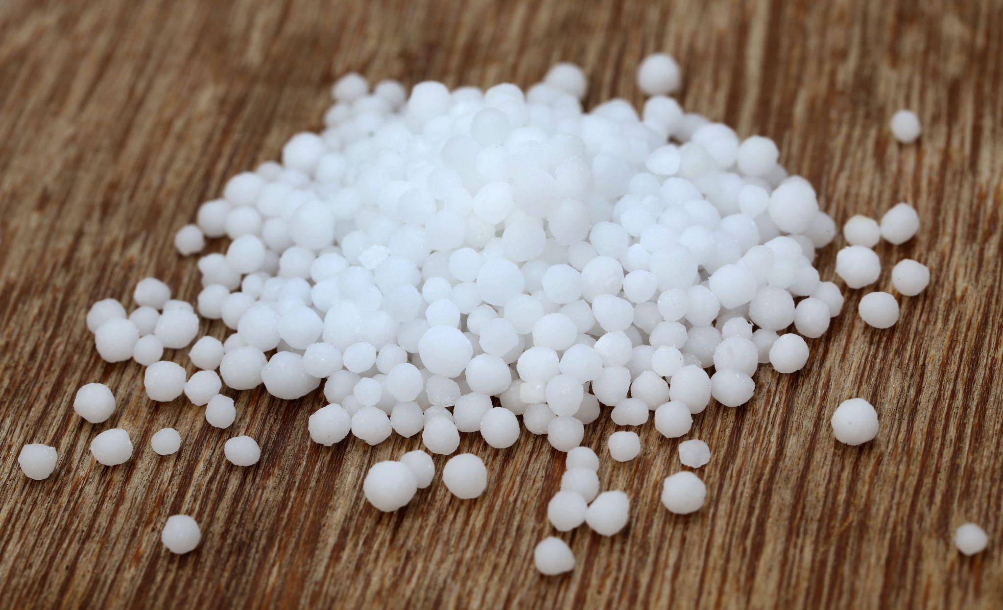 High-purity caustic soda pearls used in chemical processing and industrial manufacturing