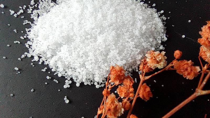 Close-up of high-purity caustic soda pearls showing benefits of caustic soda pearls for industrial use