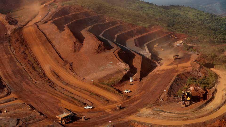 Large-scale open-pit alumina mine in Australia with industrial machinery